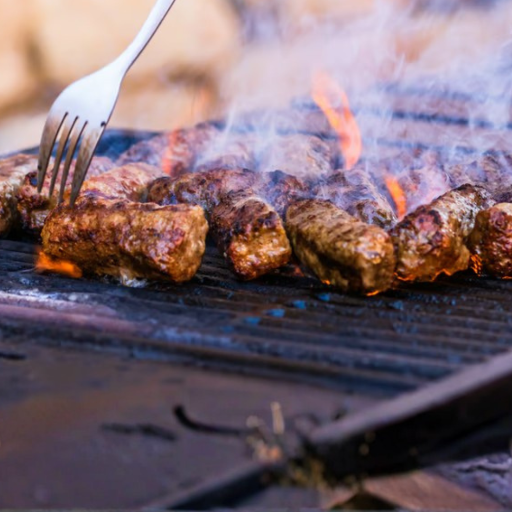 Abu Dhabi Desert Safari with BBQ, Camel Ride & Sandboarding